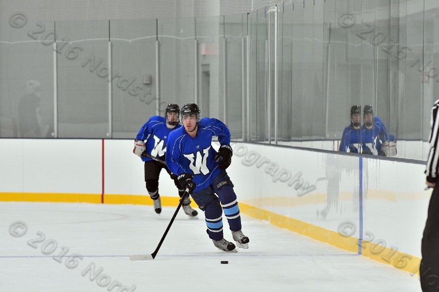 Wheaton College Men\'s Ice Hockey vs Middlesex Community College. - Photo By: KEITH NORDSTROM